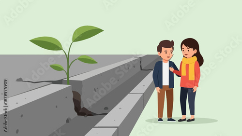 Couple observing a small plant growing through a crack in concrete