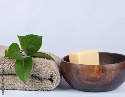 Natural Spa Still Life with Handmade Soap, Towel and Green Leaves