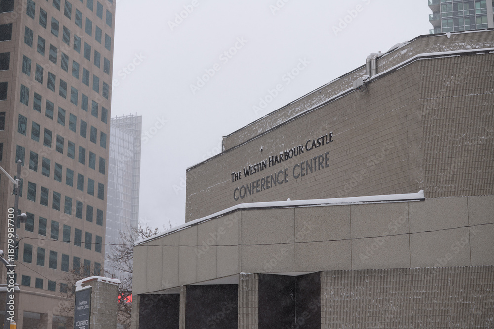 Fototapeta premium exterior building and sign of Westin Harbour Castle Conference Centre located at 11 Bay St, Toronto - winter