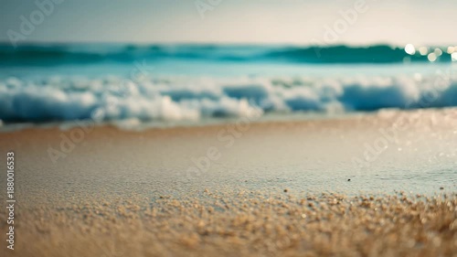 4K Closeup of soft ocean waves washing ashore on a sandy beach, creating a tranquil and serene natural background with blurred water video