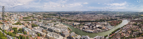 Bristol England: 28th July 2025: Drone view of Bristol Harbourside, surrounded by historic buildings along the River Avon with city in background. Panorama