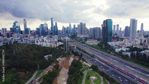 Aerial of Tel Aviv skyline and Ayalon road looking south fly right in Israel