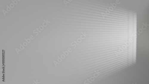 Window light and shadow projected onto the wall