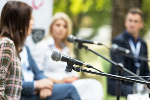 фотографія Business round table discussion with microphones, corporate panel speakers, prof