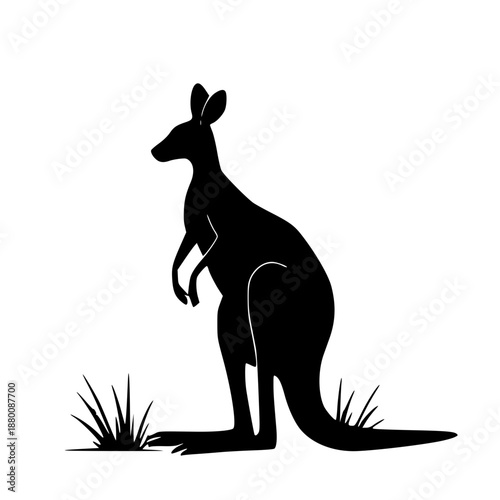 A black silhouette of a kangaroo standing on grass on a white background