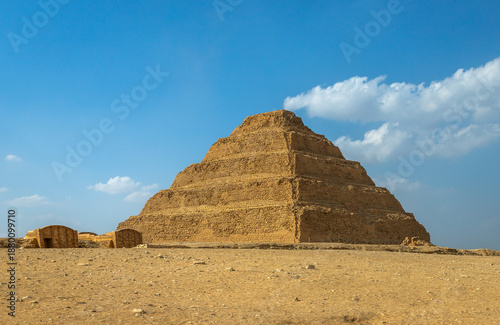 Horizontal view of the Step Pyramid of Djoser in Saqqara, Egypt, the oldest large-scale stone structure in the world, symbol of ancient Egyptian architecture and history