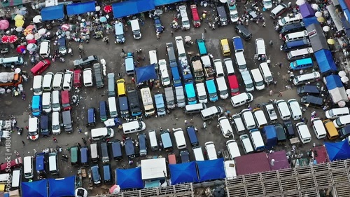 Market scene with many vehicles in Accra Ghana during the day