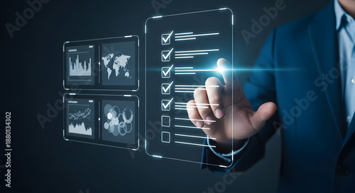 Business professional interacting with virtual interface displaying data analytics and checklist on transparent digital screens