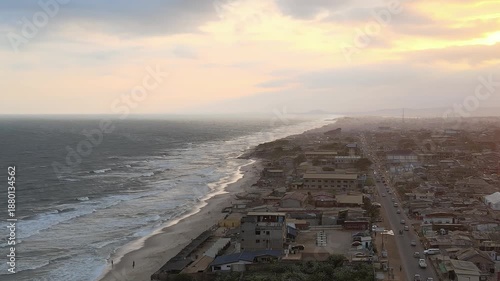 Coastal view of Accra showing shoreline and city landscape at sunset