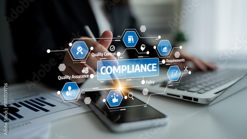 Schilderij op canvas A focused professional working on compliance in a modern office, utilizing technology to implement quality control measures and assure effective policy management