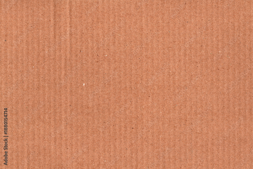 Fototapeta premium Natural brown kraft paper texture background with subtle horizontal grain and recycled fiber details. Minimal cardboard surface ideal for packaging design, eco branding, stationery, mockups, posters.