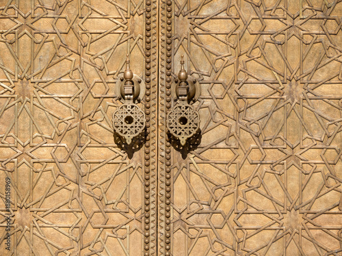 Morocco. Fez. The door ornated brass handles of central entrance of the royal palace founded by the Merinids in 1320