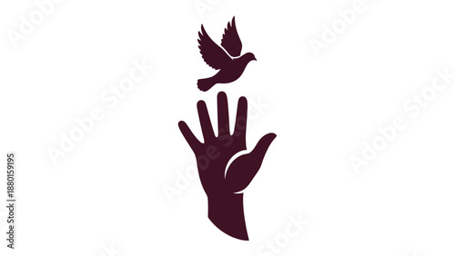 A hand releasing a dove into the air symbolizing freedom and peace