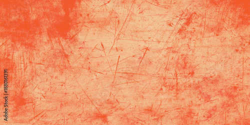 Red paint on a textured old wall with a vintage grunge design creates an aged pink and brown pattern on a rough antique parchment surface