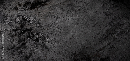 Foto Dark black cast iron surface with weathered grainy texture and rustic metallic p