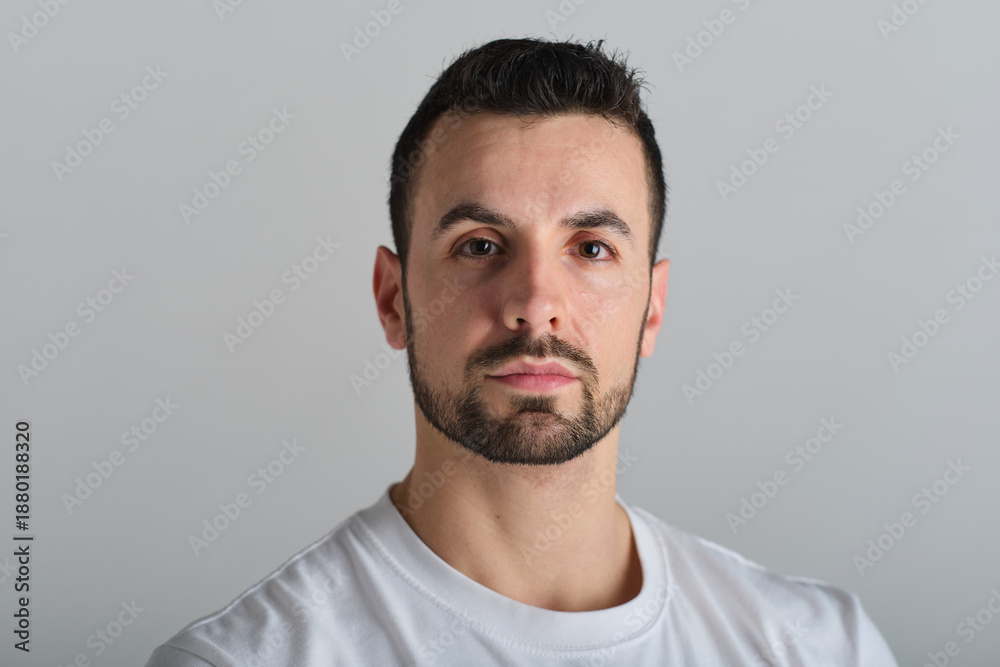 Fototapeta premium close up shot serious Confident young man posing looking at camera