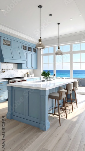 Sunlit kitchen with blue cabinets and ocean view. Light wood floors and white marble countertops create a bright space