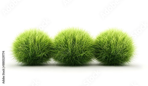 Three Lush Green Grass Balls on White Background