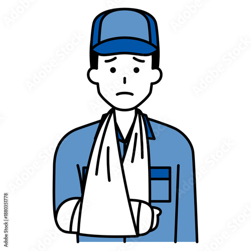 右腕を骨折しているつなぎ作業服の男性