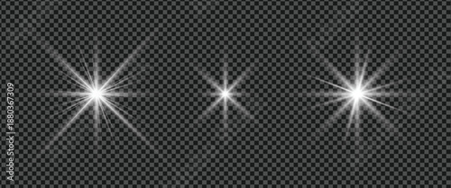 Three bright white starbursts on dark background