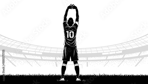 Soccer Player Celebrating Goal with Arms Raised.