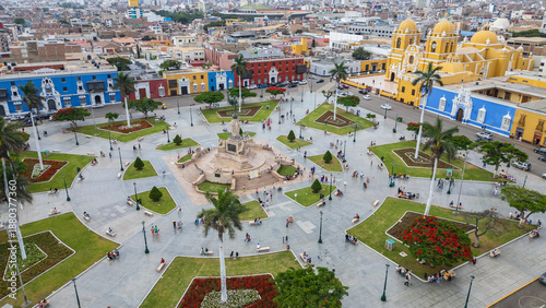 Bild auf Leinwand PANORAMIC AERIAL DRONE VIEW OF TRUJILLO PLAZA DE ARMAS, HISTORIC CITY CENTER OF