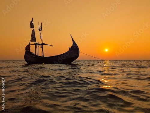 Canvastavla Silhouette of Traditional Bengali Moon Boat on the Ocean at Golden Sunset