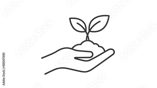 A hand holds soil with a small plant growing out of it.