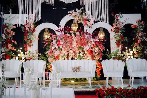 Εκτύπωση καμβά Elegant wedding stage decorated with colorful flowers, white chairs, and romantic lighting for wedding ceremony or reception