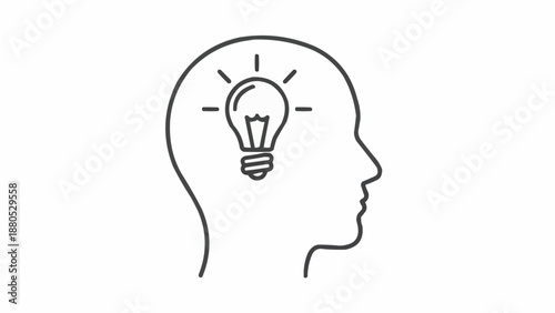 Light bulb inside human head silhouette symbolizing idea generation.