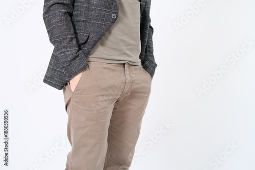 A close-up on the size of a man, on his wetsuit and pants. Paris, France - January 17, 2026. 