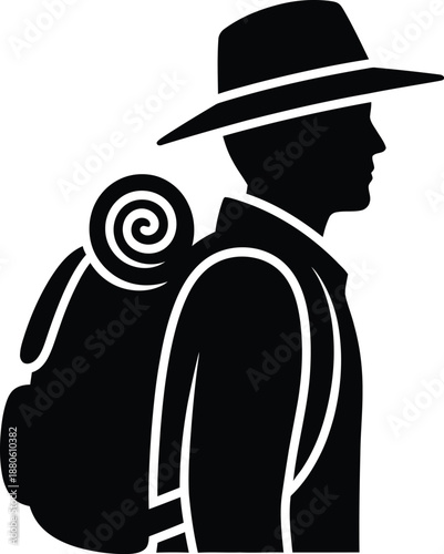 Silhouette of a traveler with a backpack and hat