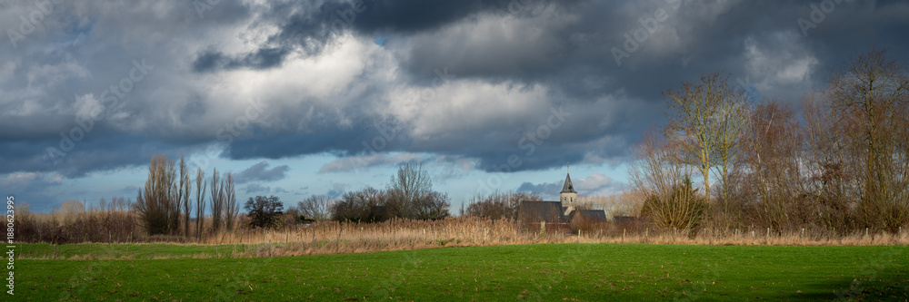 Obraz premium landscape Daknam Lokeren with church 12th century