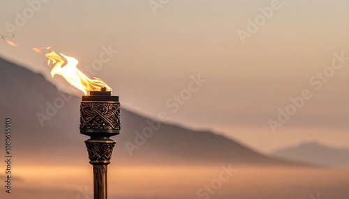 Single Viking Torch with Bright Orange Flame at Dusk Inspired by the Traditional Up Helly Aa Celebration