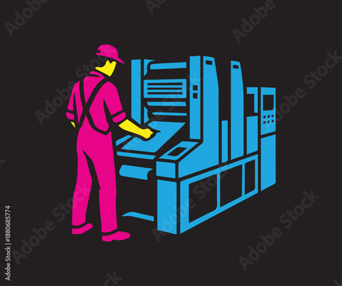 Worker operating industrial machine in a modern printing facility for manufacturing processes
