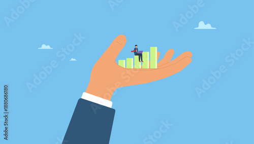 Businessman working with computer on growth graph in giant hand. Business support or improvement, growing career or financial earning chart, investment growth, income or rising revenue.