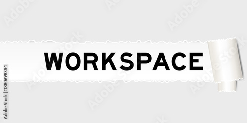 Ripped gray paper background that have word workspace under torn part
