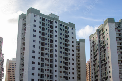 A collection of modern residential buildings in an urban area.