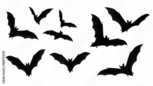 Black bats flying in various directions on white background for halloween decoration