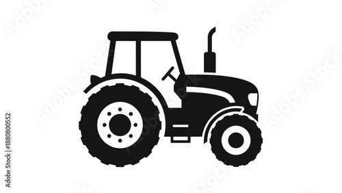 Robust black silhouette of a farm tractor, representing agriculture and rural machinery on an isolated white background.
