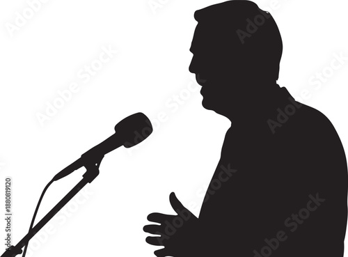 Silhouette of a man gesturing with hands near a microphone