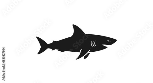 Black silhouette of a shark swimming.