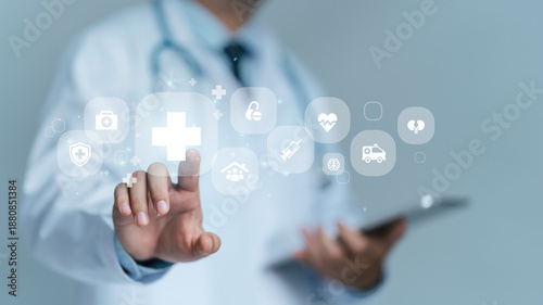 Cuadro en lienzo Male medicine doctor using healthcare and medical care icons for the Health insurance concept in hospital background