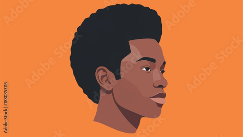 Portrait of a young Black man with an afro hairstyle.