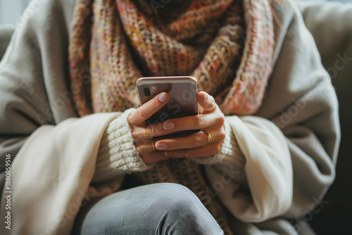 Hands holding smartphone with blank screen, clean modern lifestyle mockup