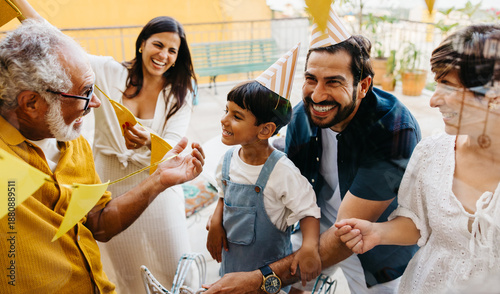 Photography Family celebrating a birthday with festive decorations and joyful laughter outdo
