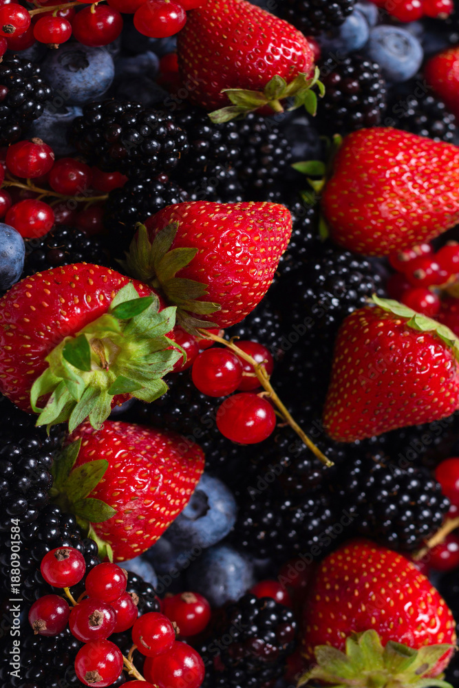 Fototapeta premium Blackberry, raspberry, blueberry, red currant and mint background.