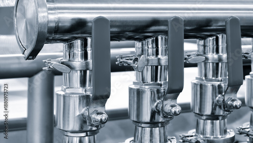 Fotografie Food production machine with stainless steel pipes, cooling radiator as separato