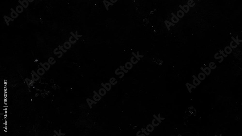 Dark grunge texture with purple dust particles black