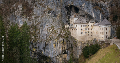 Aerial Panorama of Predjama Castle: Medieval Renaissance Fortress Built into a Cave Cliff, Slovenia Landmark, No People